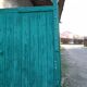 Old wooden door with pulley