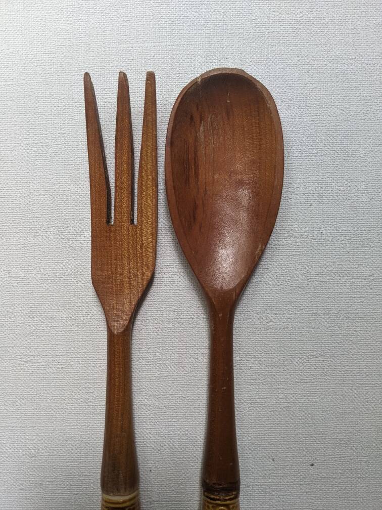 Antique wooden salad servers with earthenware handles, handcrafted