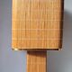 Bedside lamp in raffia