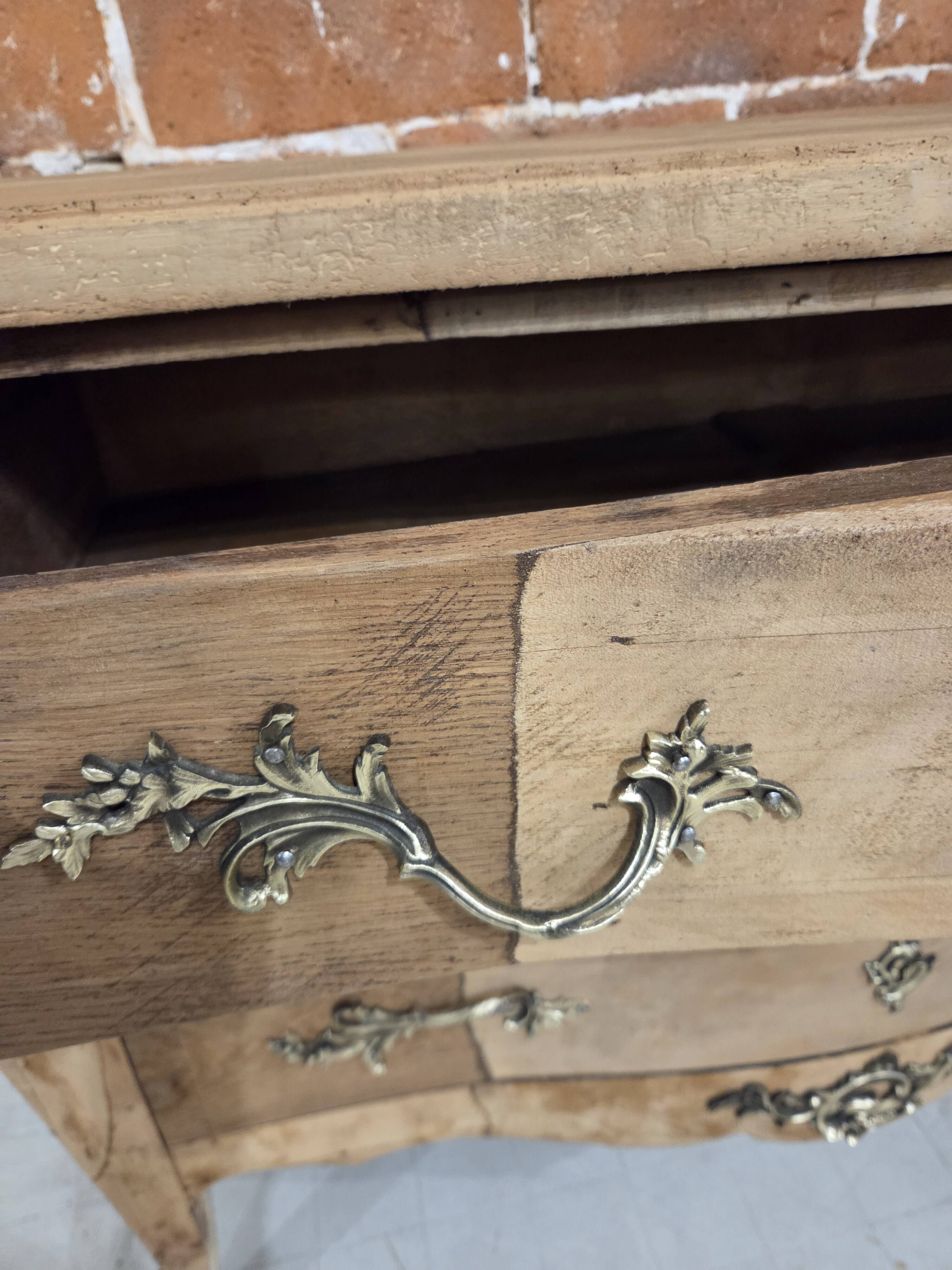 Stripped chest of drawers with bronze handles