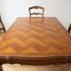 Dining table set with 6 chairs in cherry wood.