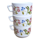 Set of 3 vintage Arcopal coffee cups in opaline with floral decoration.