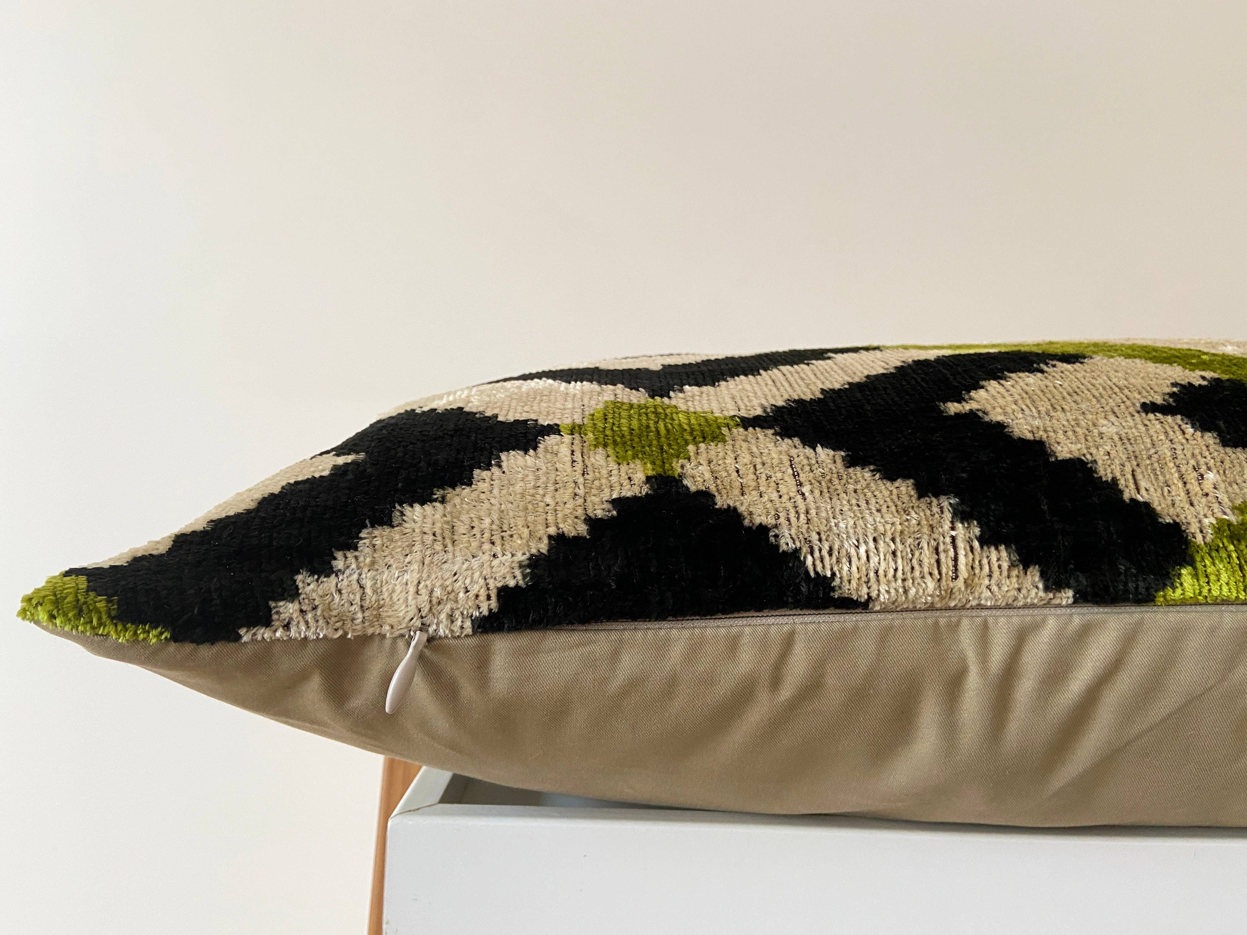 Velvet cushion Ikat green diamonds