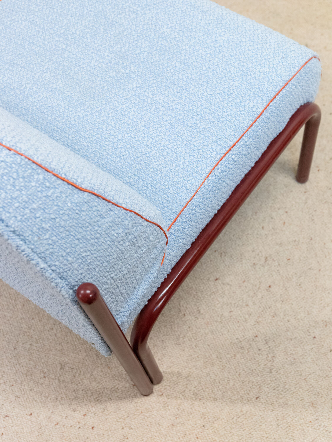 Souvignet armchair reupholstered in sky blue boucle.