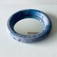Round ceramic wall mirror