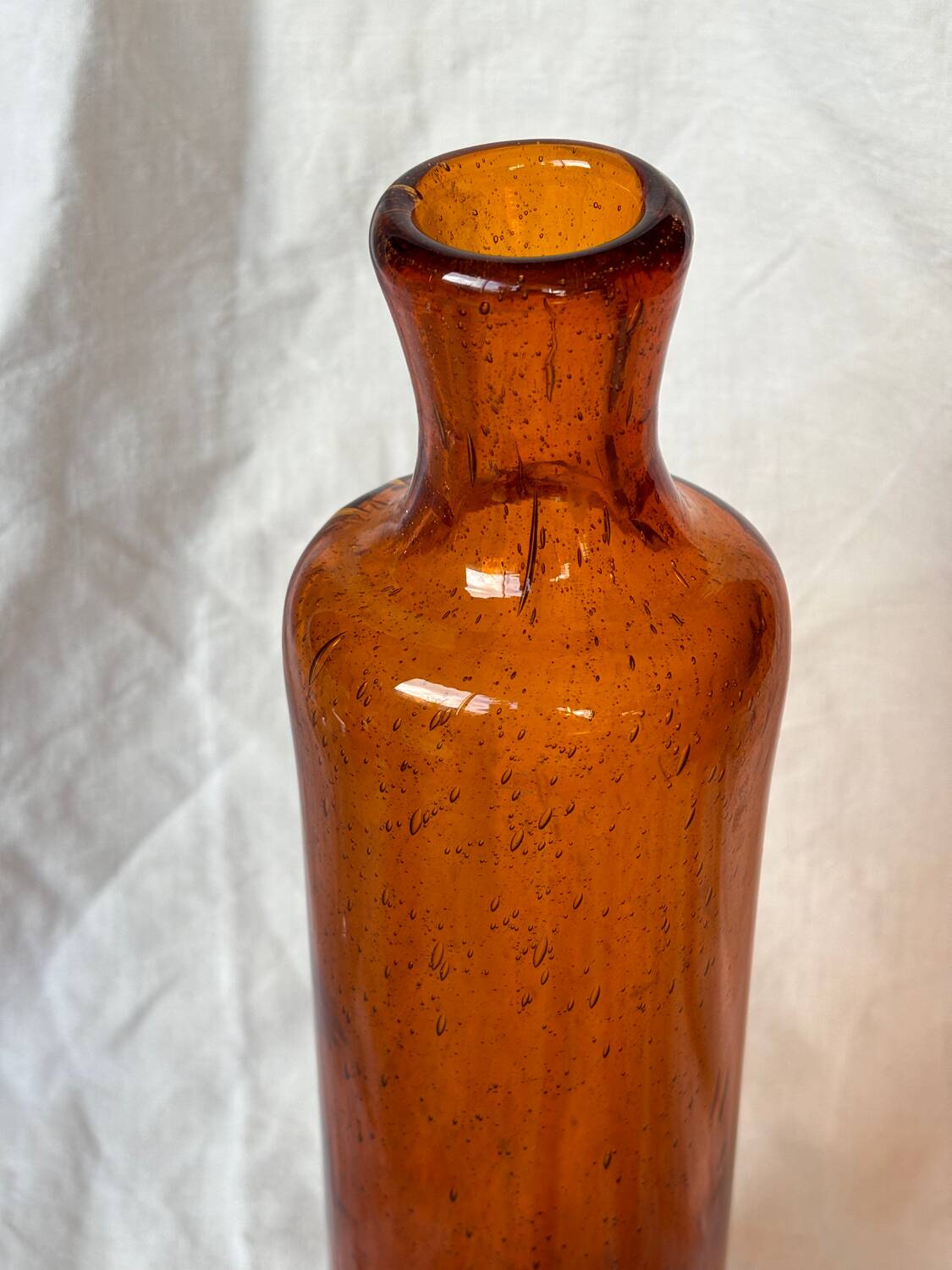 Biot blown glass bottle