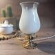 Lampe d'appoint art déco pied bronze opaline blanche