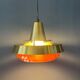 Mid-century Danish style orange brass suspension light.