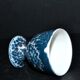 Vintage egg cup in iridescent blue metallic porcelain
