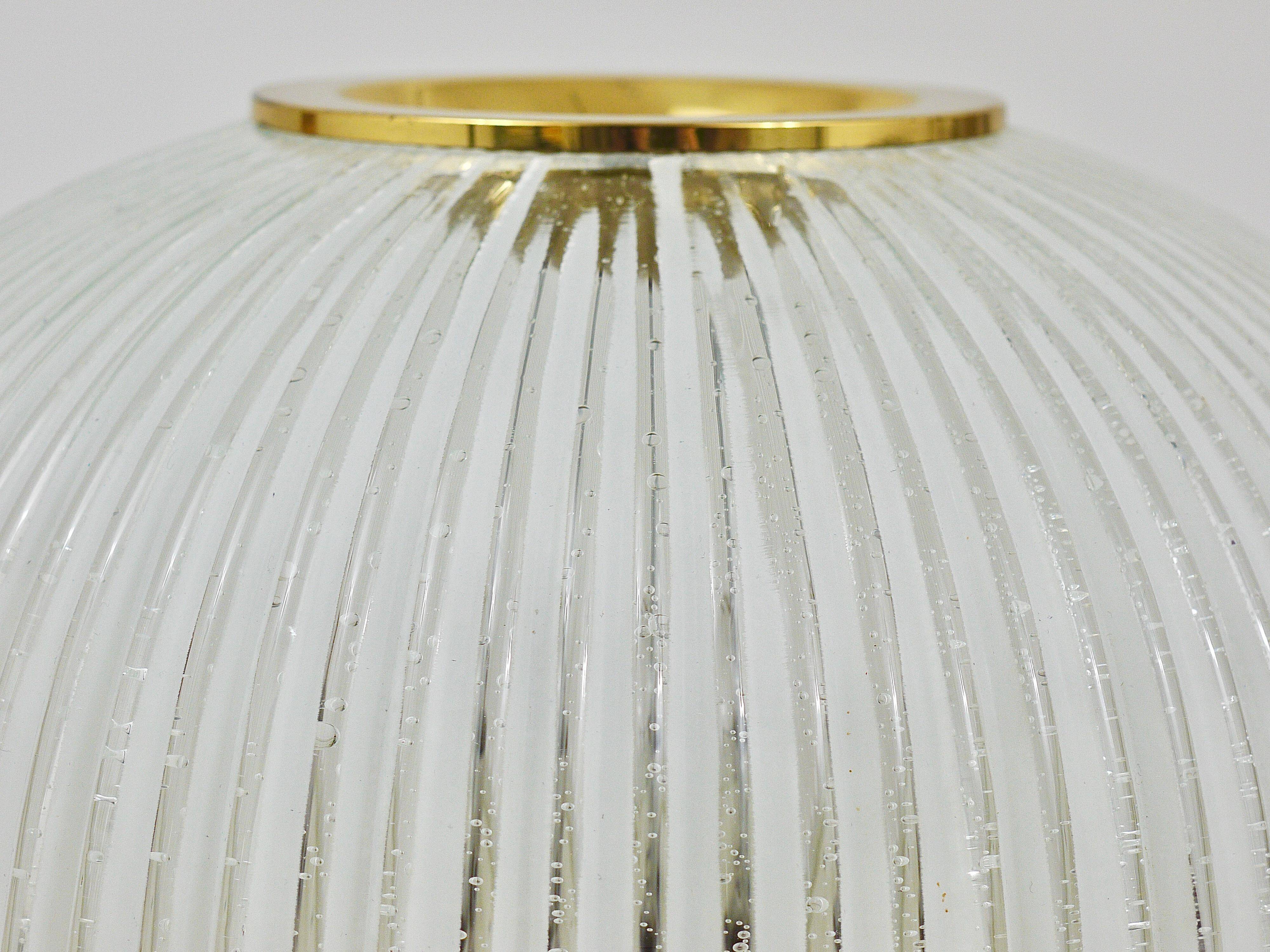 Large striped glass ceiling lamp in brass, Limburg, Germany, 1970s.