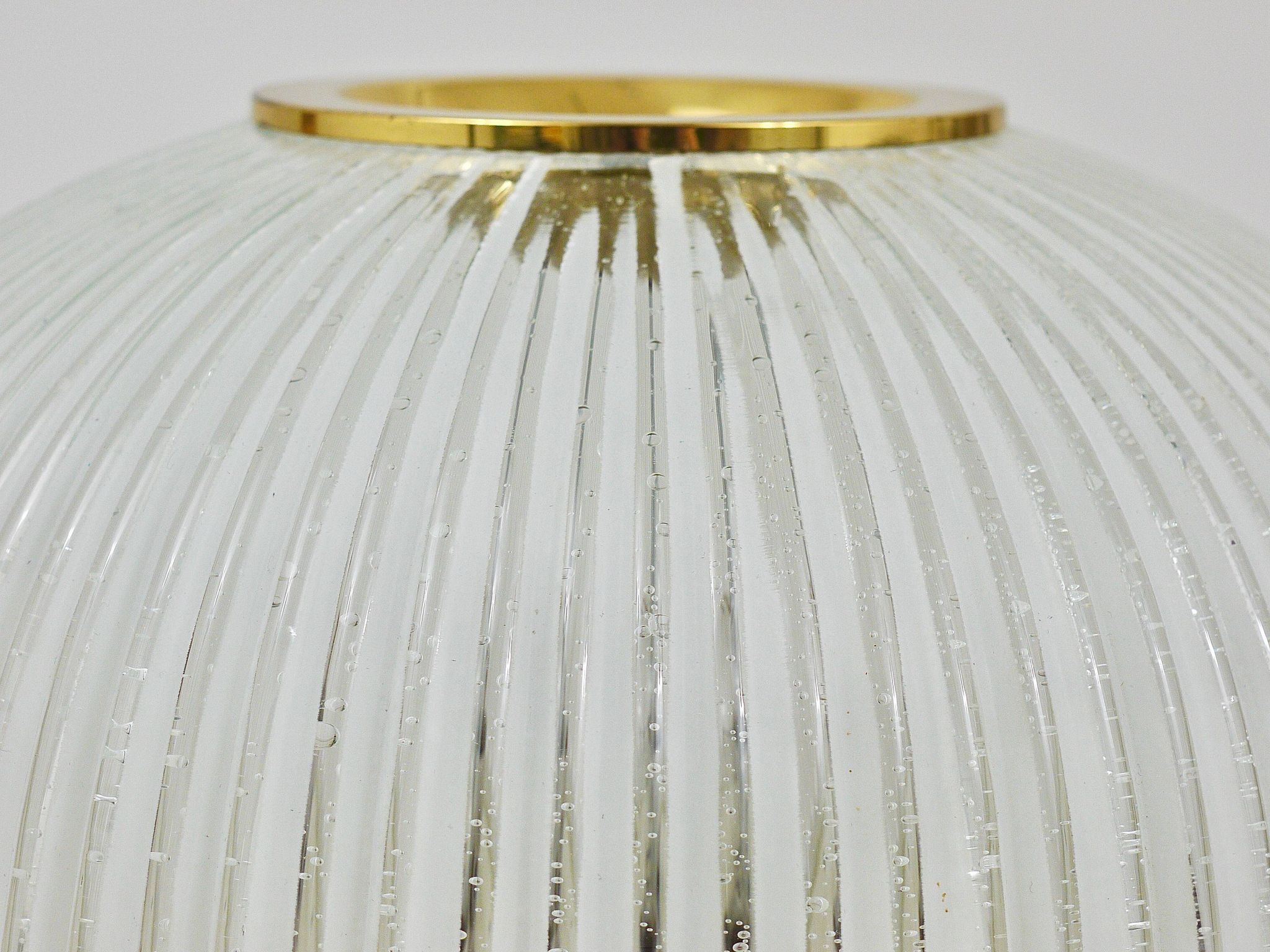 Large striped glass ceiling lamp in brass, Limburg, Germany, 1970s.