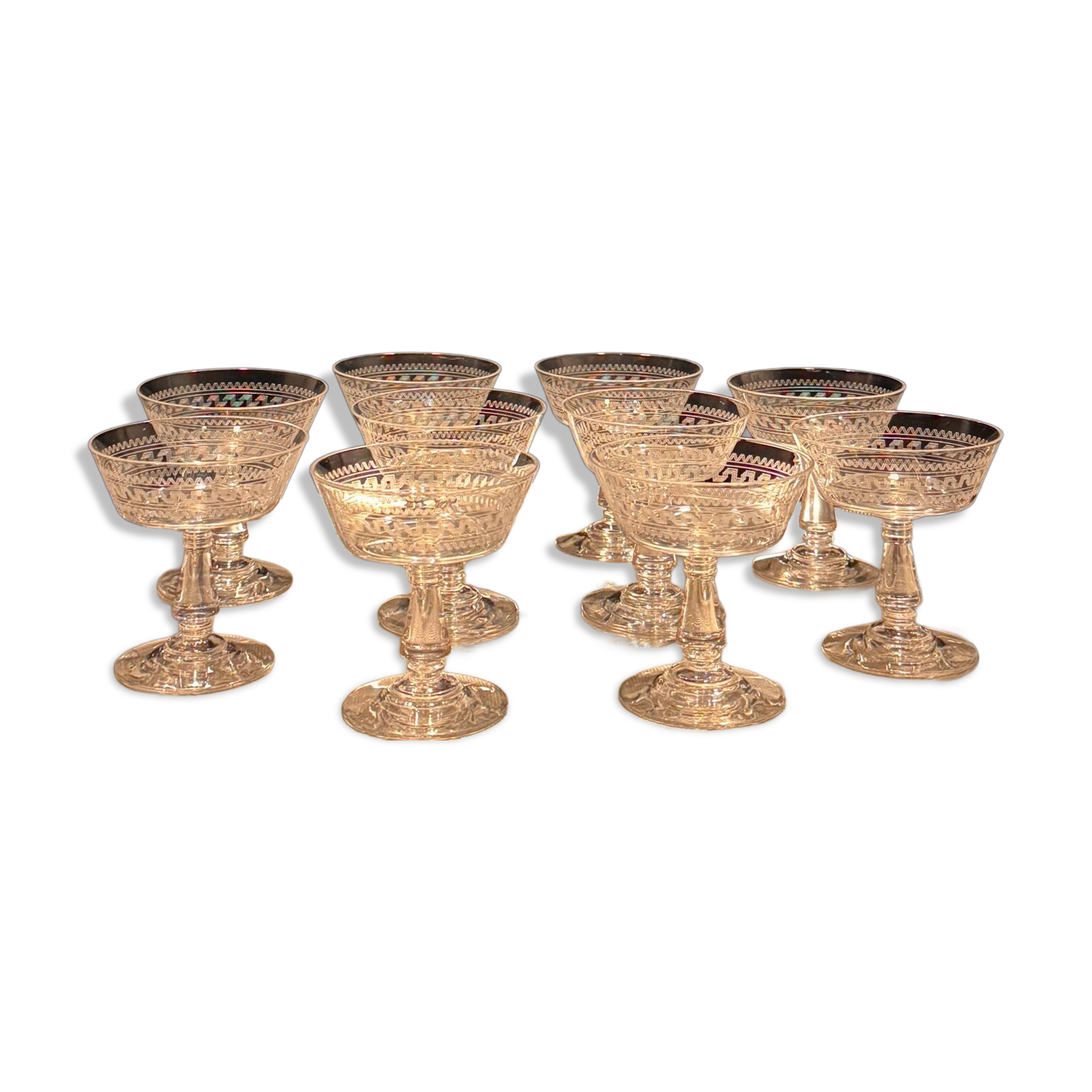 Baccarat, set of 10 engraved crystal champagne glasses from 1900.