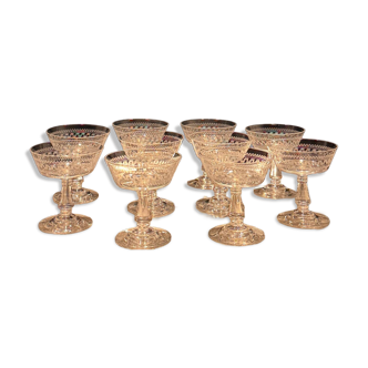Baccarat, set of 10 engraved crystal champagne glasses from 1900.