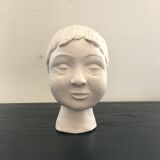 Plaster girl's head