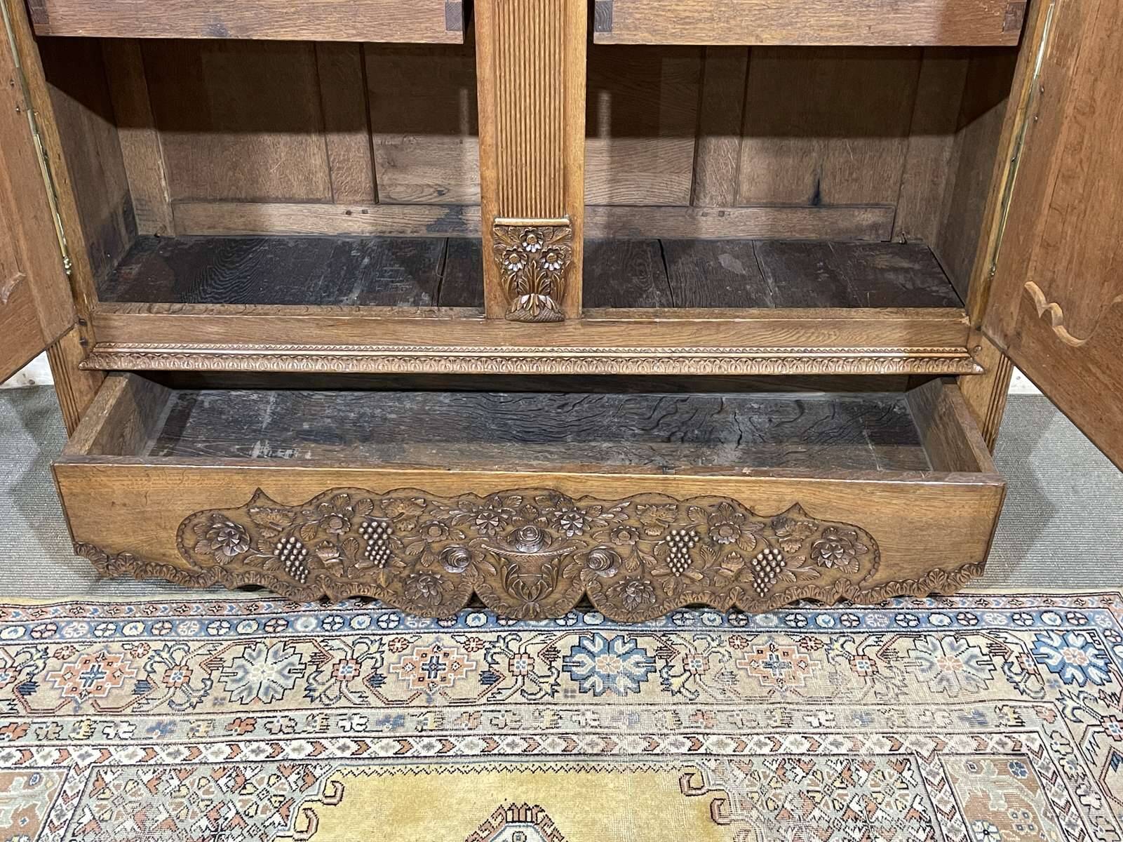 19th-century Norman wedding armoire in blonde oak.