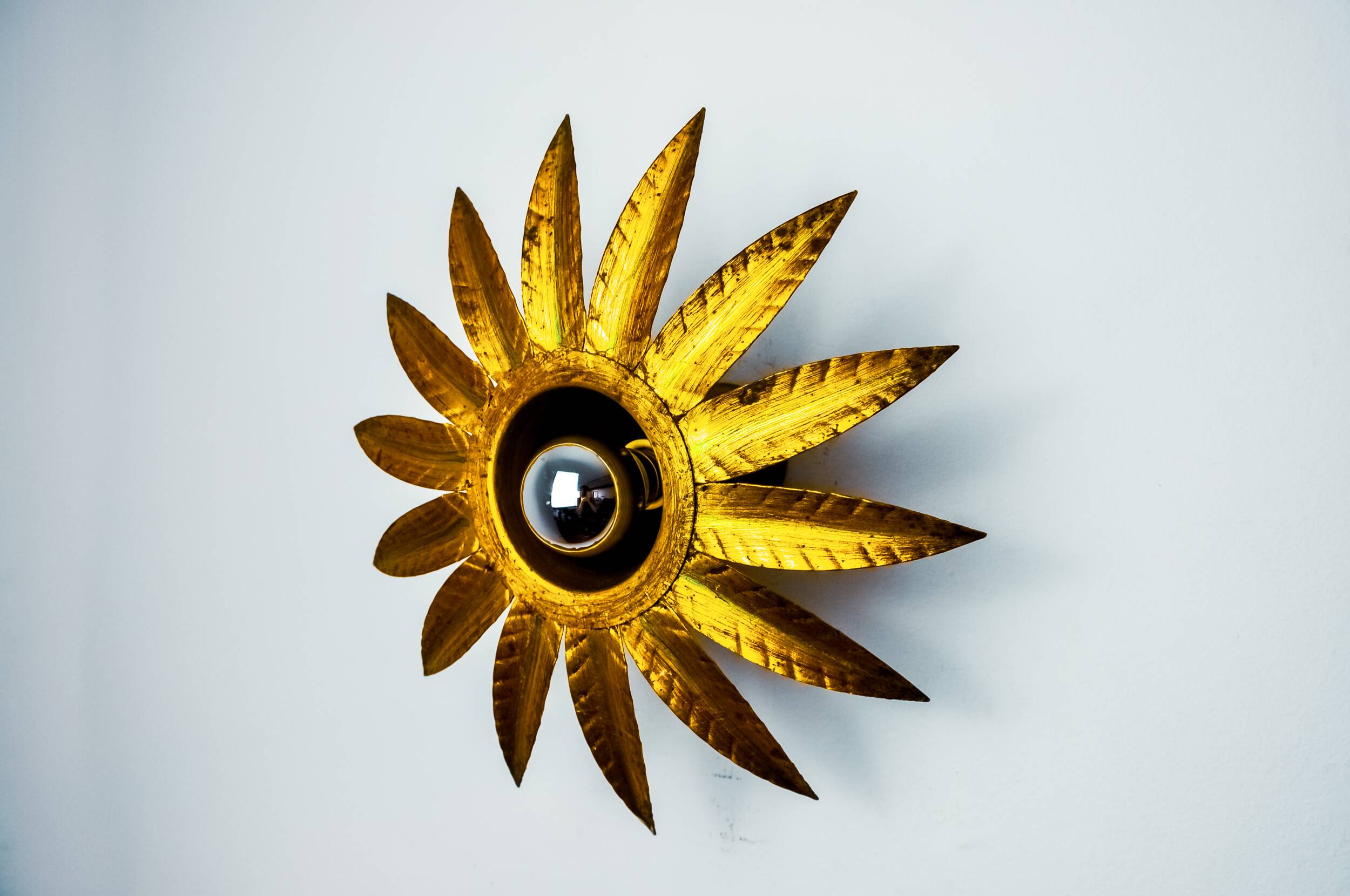 Sun wall lamp by ferro arte, metal and gold leaf, Spain, 1960