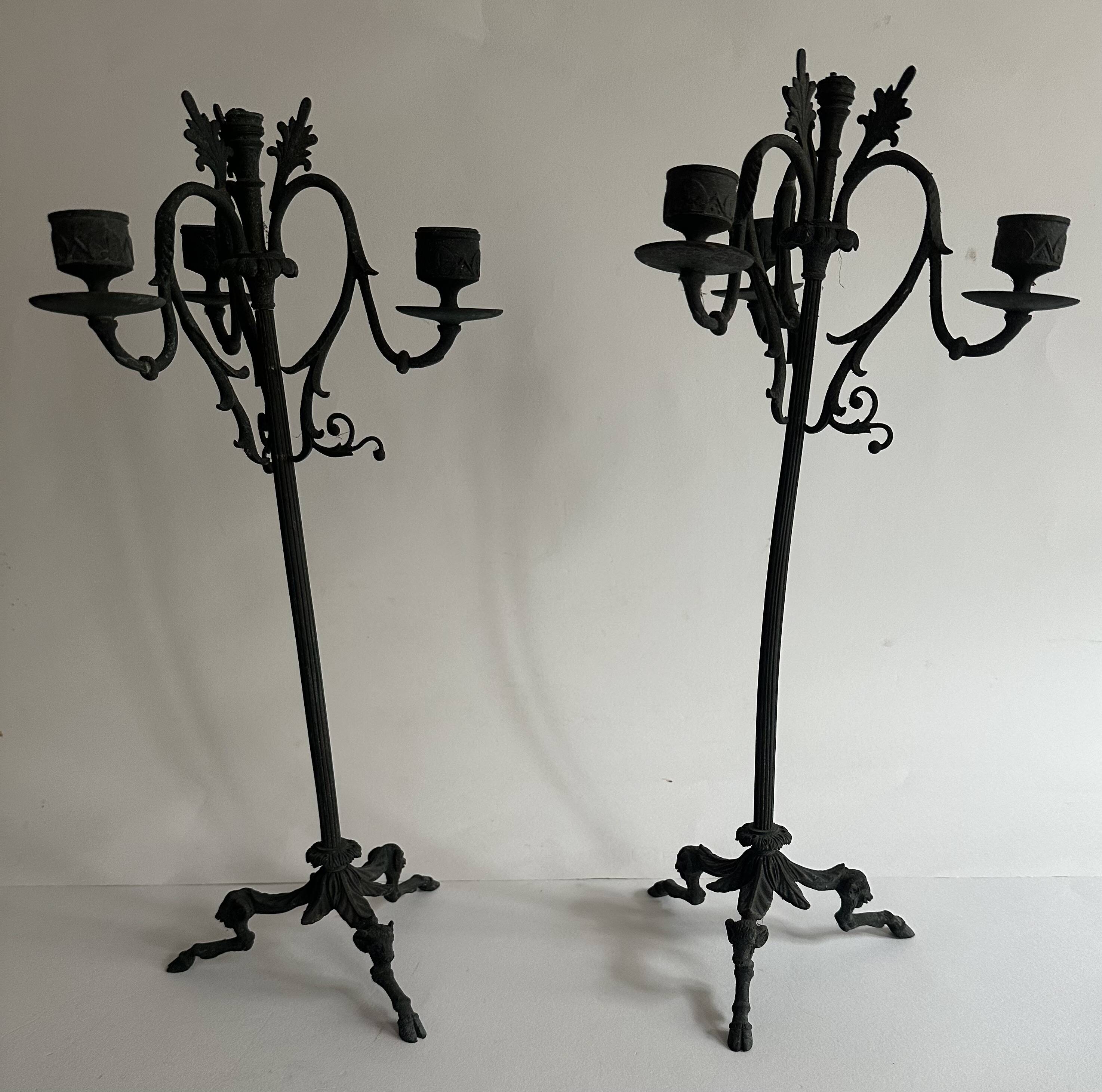 Pair of large Napoleon III candlesticks in patinated bronze