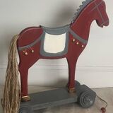 Antique toy, small horse on wheels