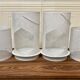 SET OF 2 LARGE METAL CANDLE HOLDERS IN SCANDINAVIAN DESIGN.