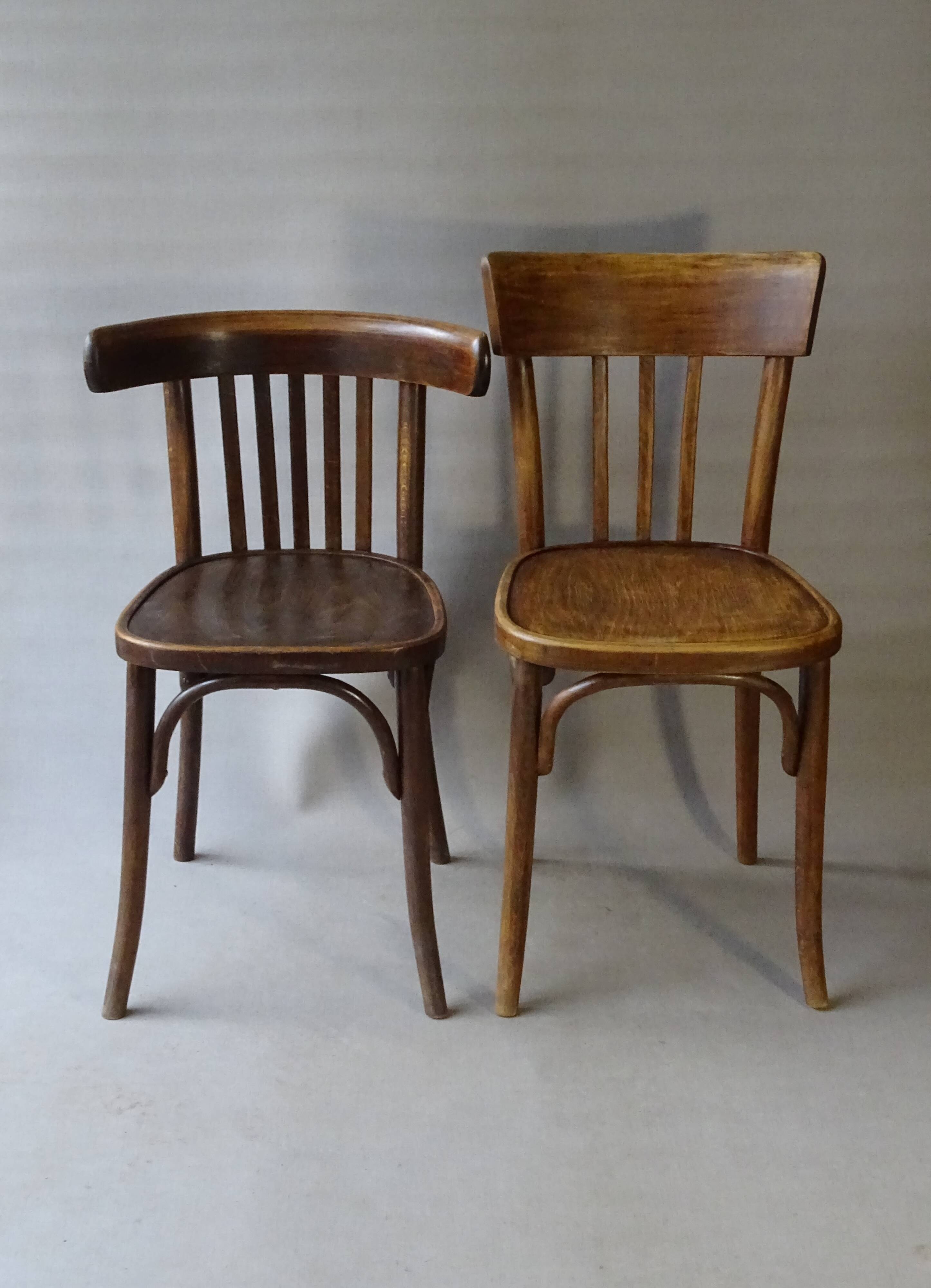 Set of 36 mismatched Bistrot chairs, 1920 to 1950, wooden seats.