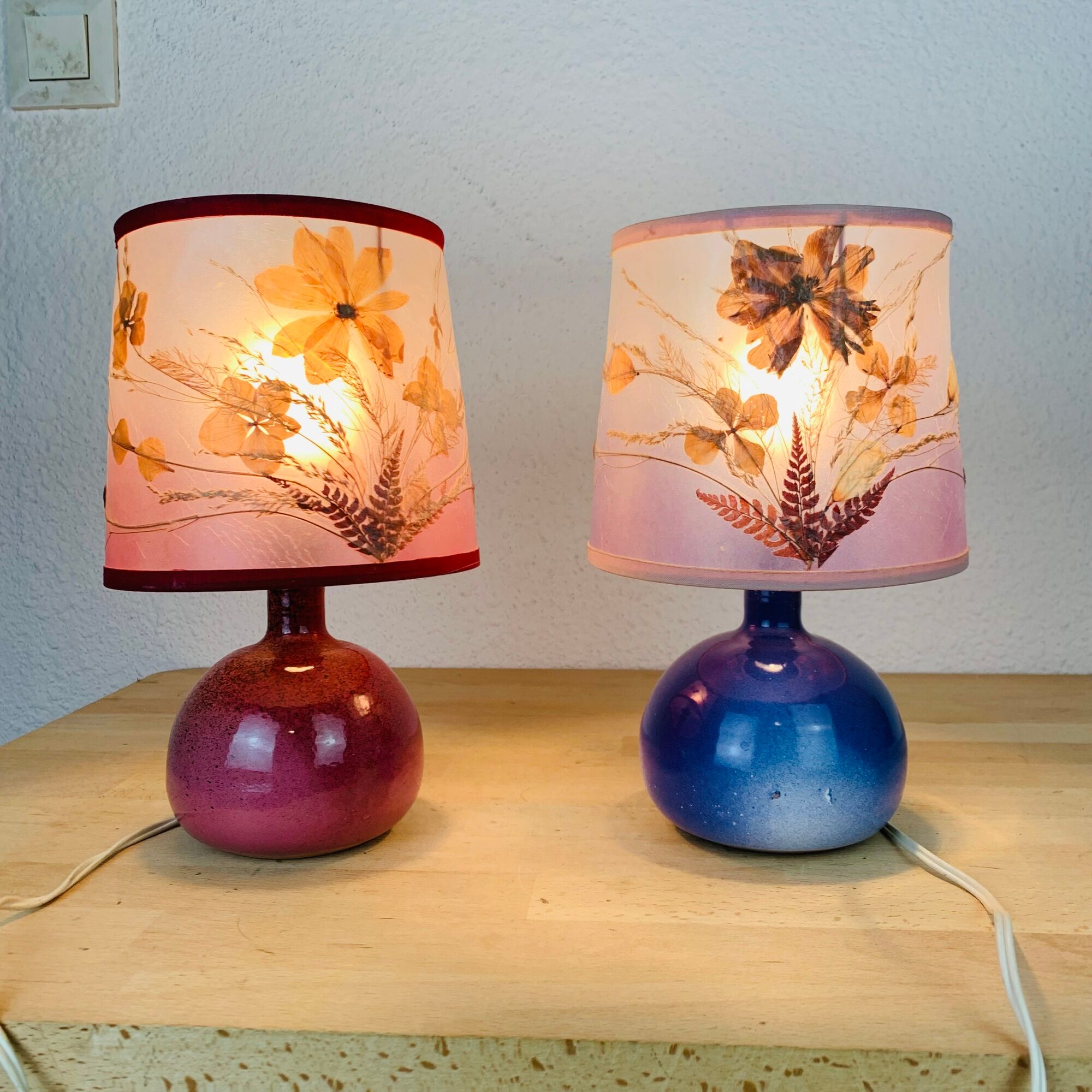 Pair of pink and blue ceramic fig lamps, dried flowers lampshade