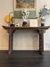 Console chinoise en orme ancien, piètement sculpté ajouré et plateau g