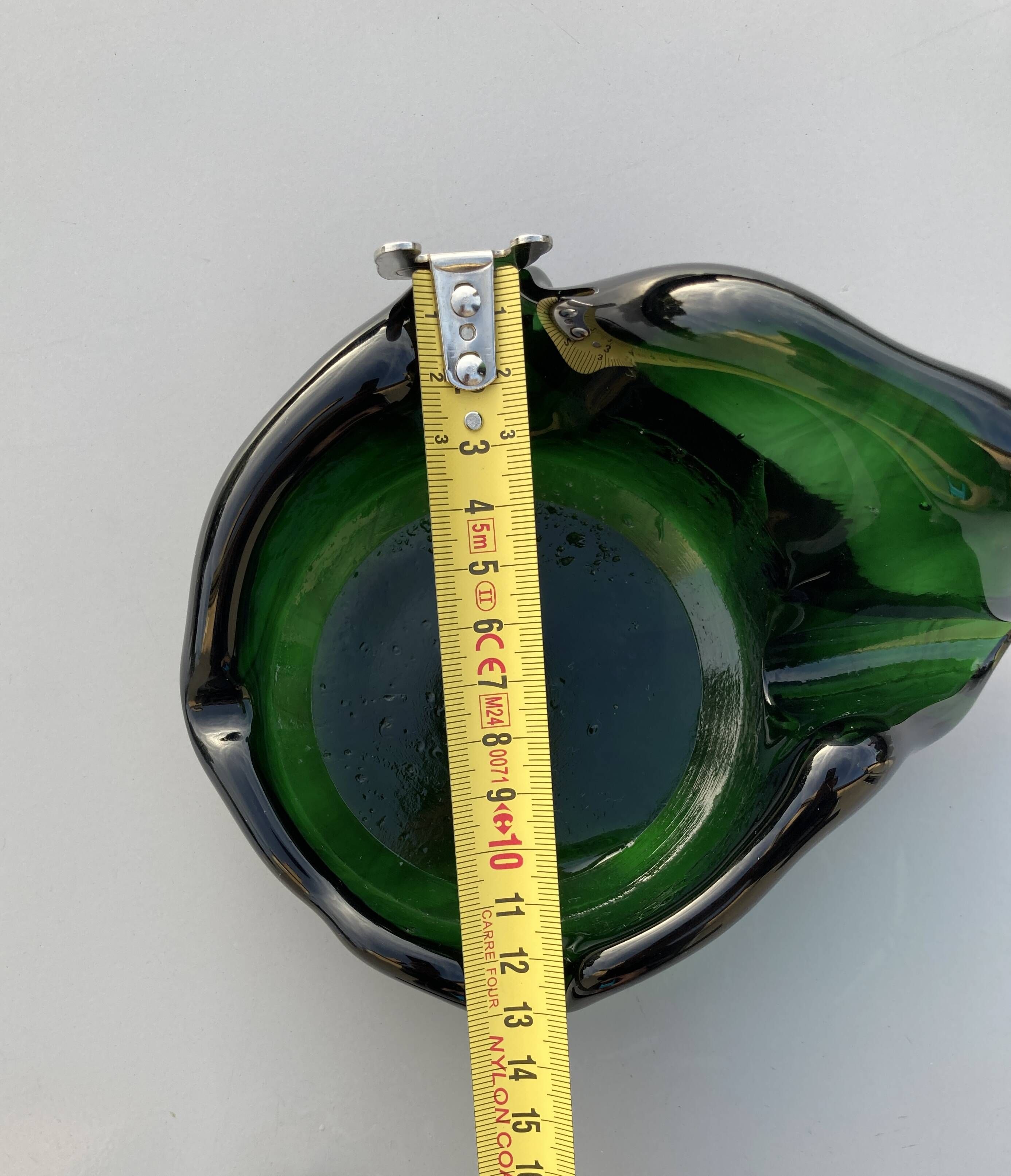 Sculptural ashtray in emerald green glass