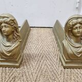 Cast iron andirons heads of women