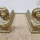 Cast iron andirons heads of women