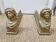 Cast iron andirons heads of women