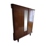 Vintage 1960s wooden wardrobe with a central mirror and tapered legs.
