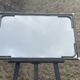 Vintage rectangular wall mirror in tubular metal and brass, 1970s/1980s.