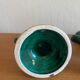 Pair of green and gold ceramic candlesticks