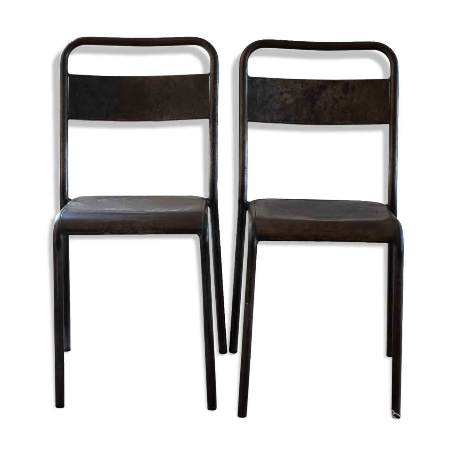 Pair of patinated metal chairs