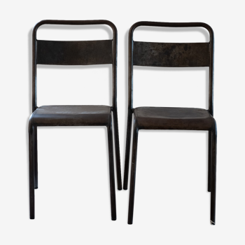 Pair of patinated metal chairs