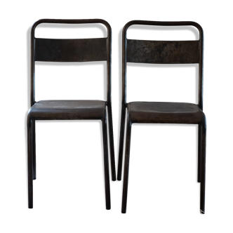 Pair of patinated metal chairs