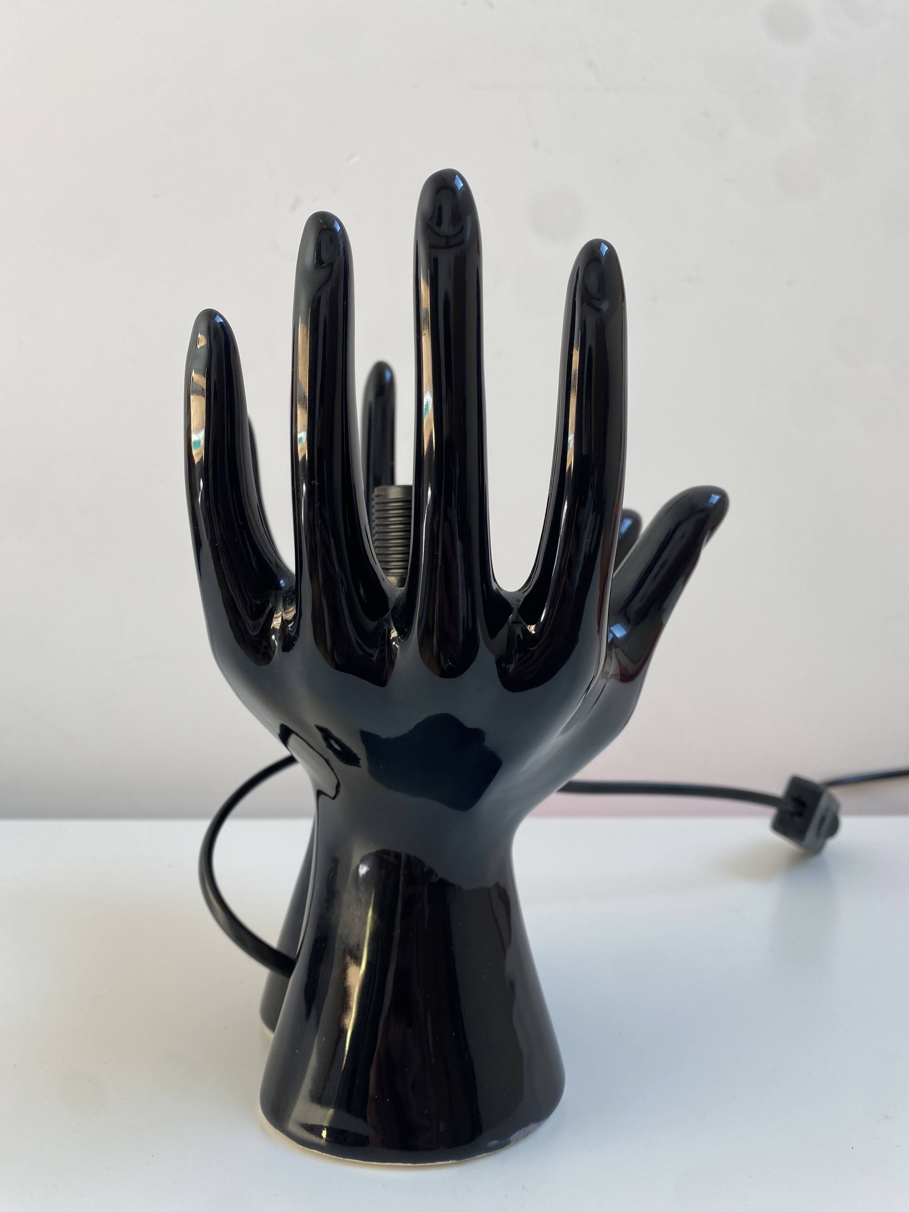 Sculpted ceramic globe lamp.