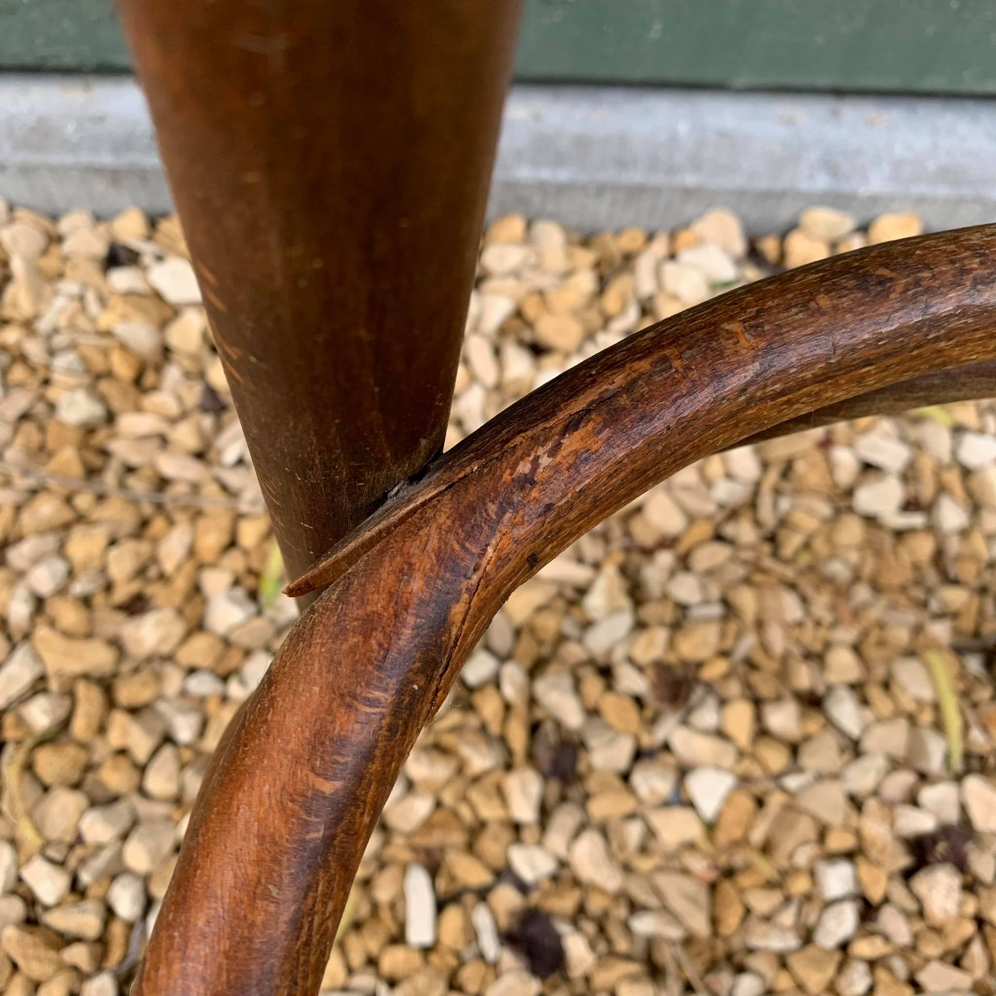 Curved wooden bistro stool