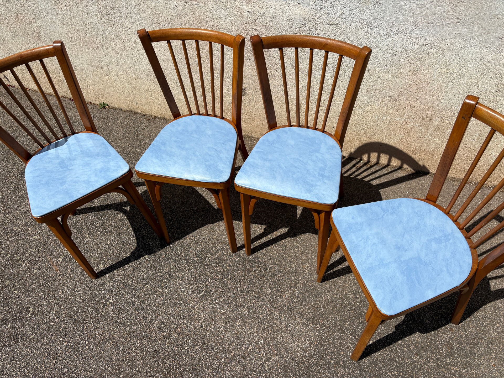 4 blue Baumann bistro chairs