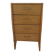 Vintage chest of drawers in raw wood.