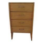 Vintage chest of drawers in raw wood.