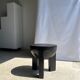 Black mango wood tripod side table with a semi-spherical top, height: 45 cm, diameter: 44 cm.