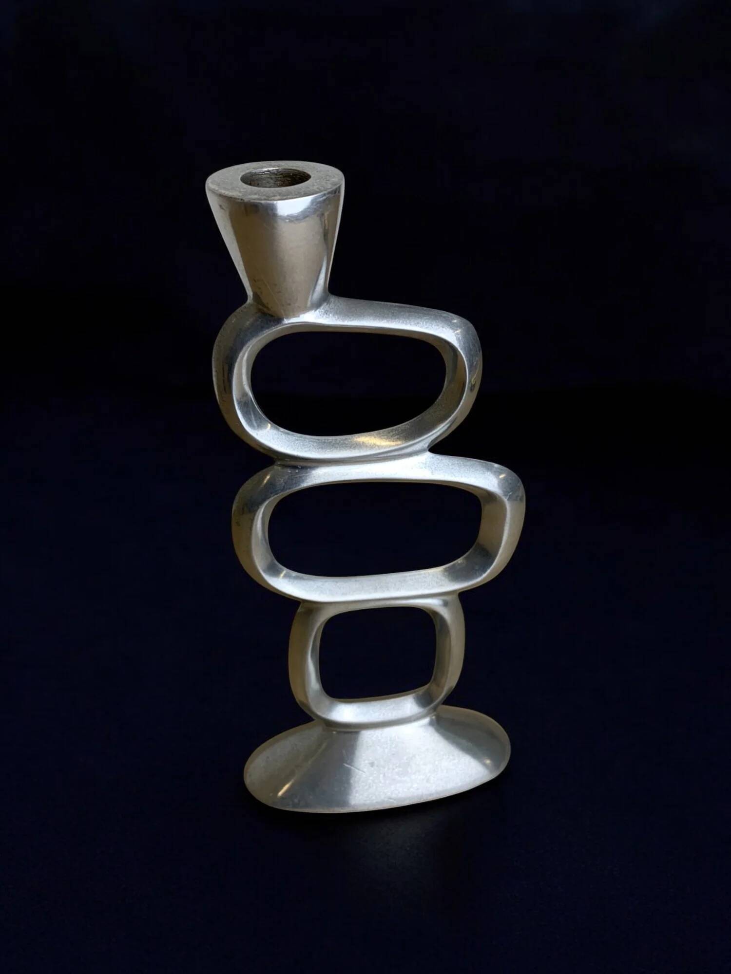 Circle candlestick by Matthew Hilton, solid aluminium, England, 1980s