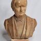 Bust of a notable in terracotta, 29 cm, signed Pasquet, 1870, on a base.