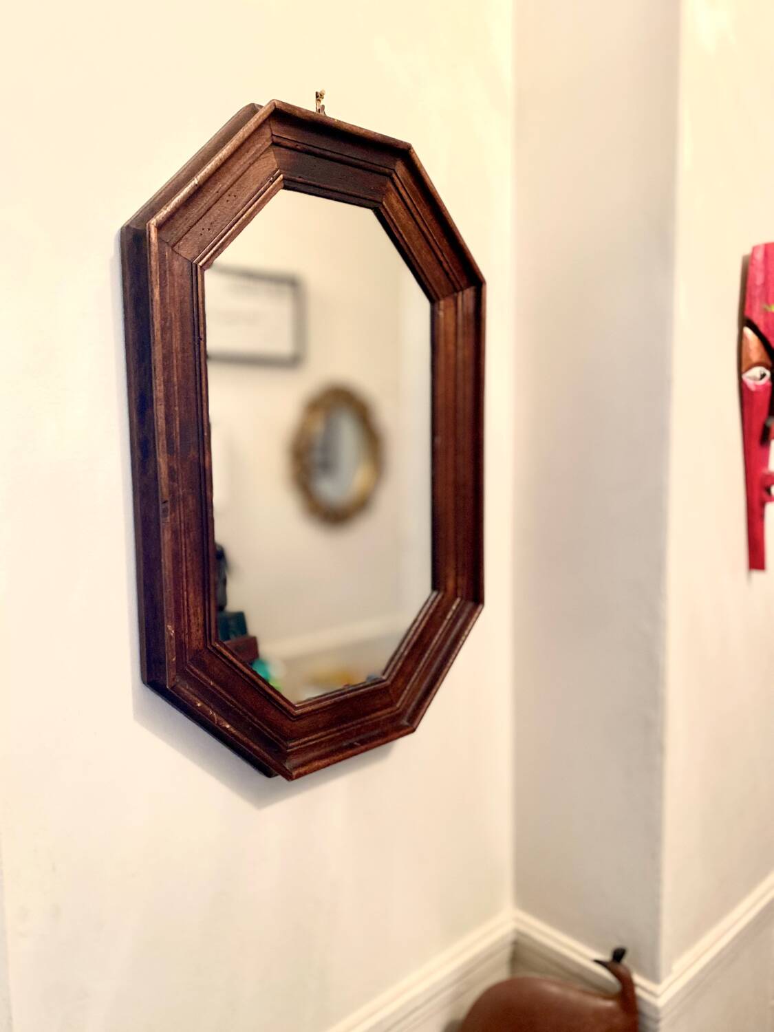 Vintage dark wood octagonal mirror
