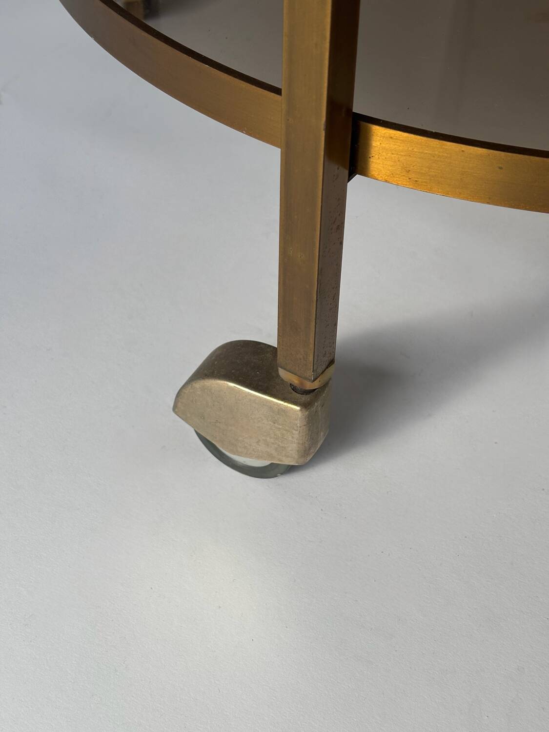 Rolling dessert trolley in brass and smoked glass, 1960