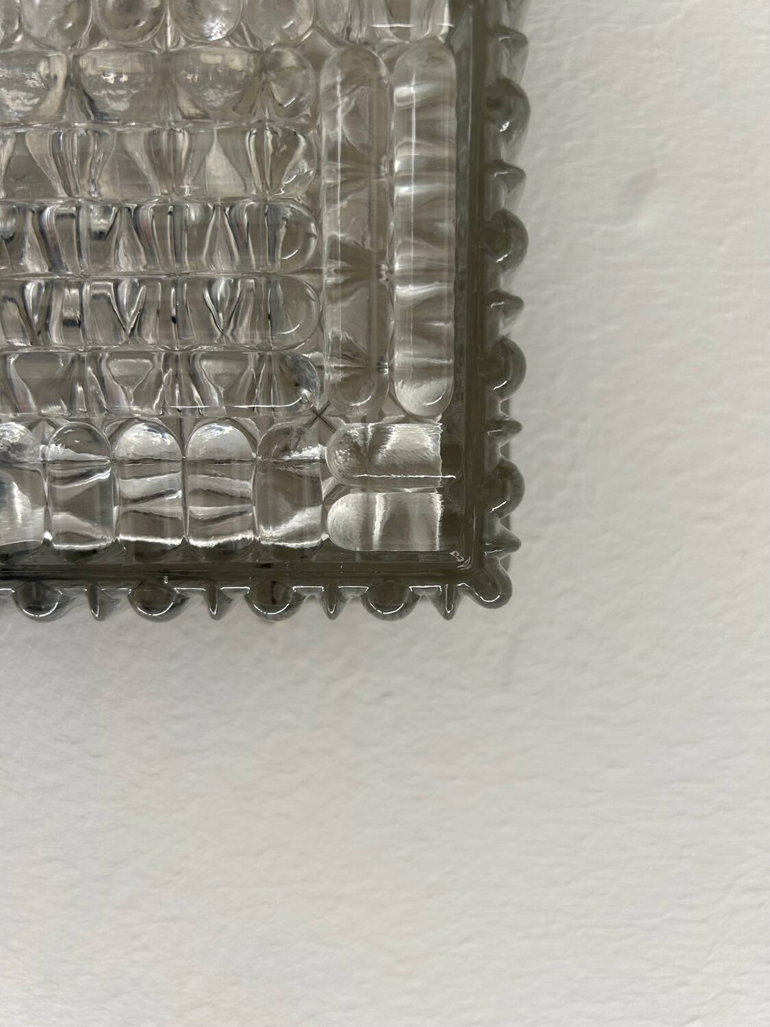 Vintage wall lamp in pressed molded glass, France 1970