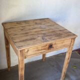 Small vintage desk made of solid wood.