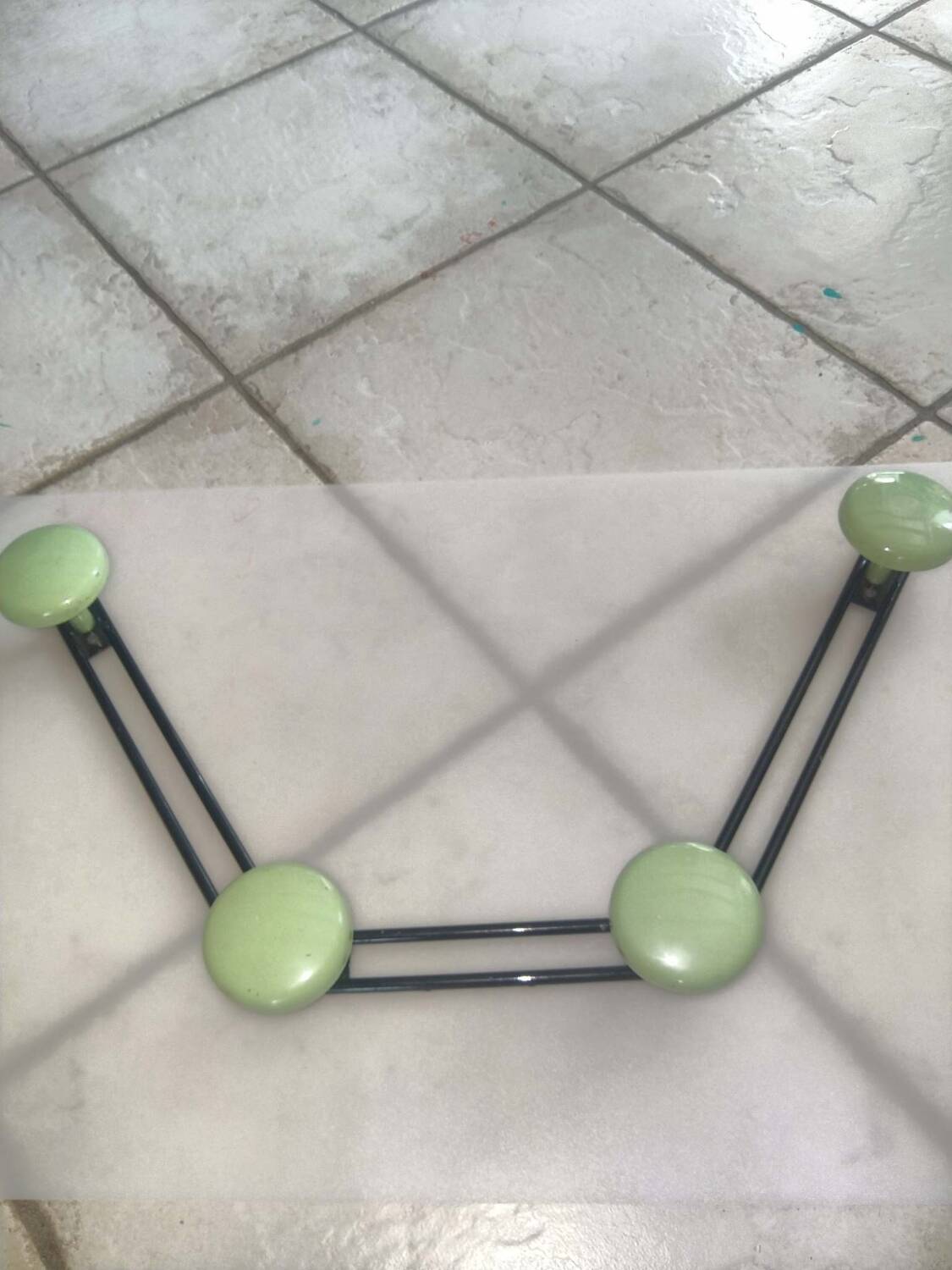 Coat rack with 4 green metal hooks from the 70s