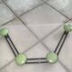 Coat rack with 4 green metal hooks from the 70s